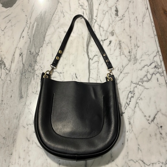 Black Anthropologie purse with gold hardware. One pocket inside. - Picture 1 of 6